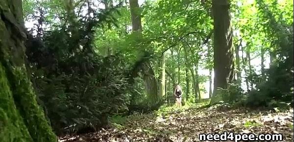  Amateur babe squatting and pissing in the woods